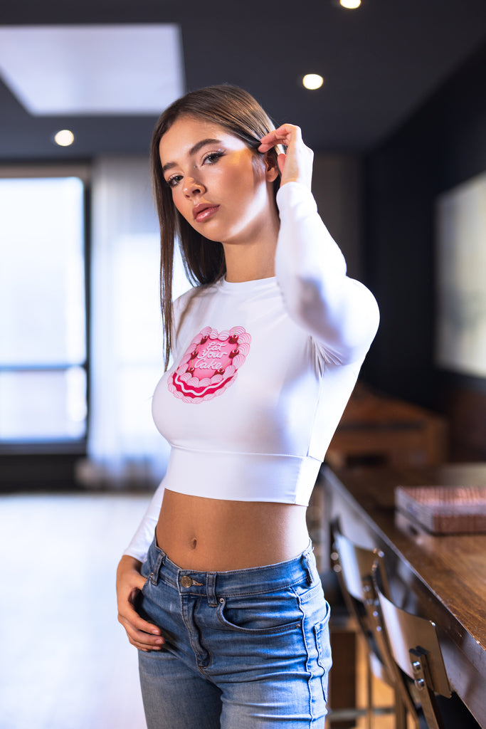 Long Sleeve Crop Top with Pink Cake and Cherries Eat Your Cake Funny Design Feminist Statement by Not Your Sub (White)