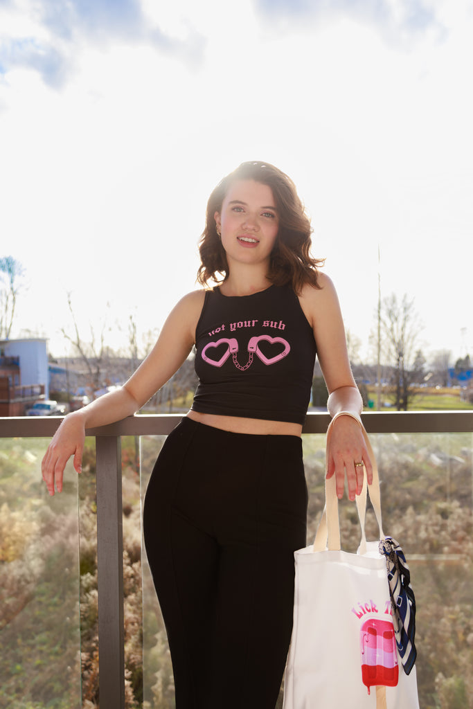 Sleeveless Graphic Crop Top with pink hearts and cuffs Feminist Statement Heartbreaker by Not Your Sub (Black)